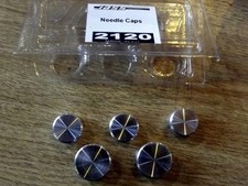 Instrument dial needle cap