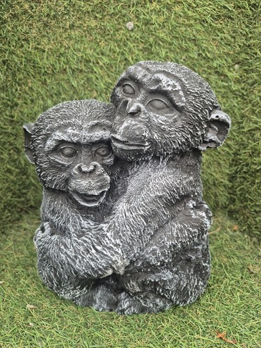 Concrete hugging monkey - hugging, statue