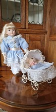 Porcelian Doll with Pram