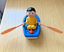 ZC428:  Vintage Windup Plastic Toy Row Boat