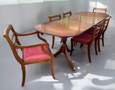 Mahogany Extending Dining Table & 6 Chairs, Brass Castors.