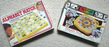 Two 1980's children's games - Alphabet Match and Donald's Tricks n' Treats