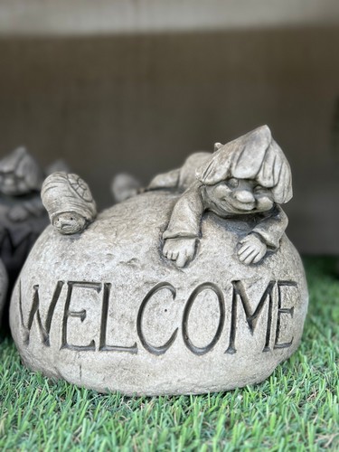 Stone welcome pixie sculpture