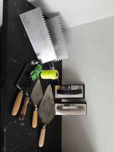 Tiler and bricklayer - tiler,