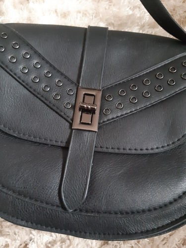 Black across the body - pu,