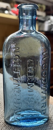 1895 mid blue glass - mid, chemist