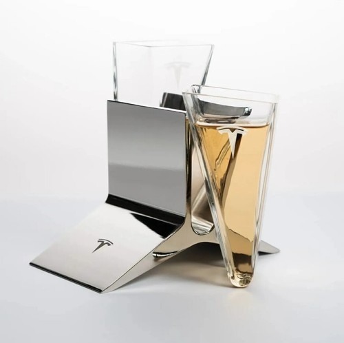 Tesla sipping glasses with - tesla,