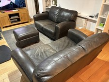 Leather sofas and footstool -