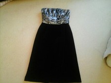 Ladies evening party dress size 14 Black Velvet with Silver material top.Quality
