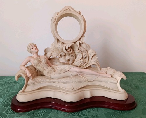 Mantel clock woman sofa - clock,