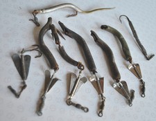 A SMALL SELECTION OF VINTAGE MAKERAL/POLLOCK SPINNERS INCLUDING SANDEEL LURES