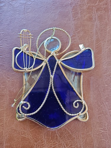 Stained glass blue - angel, sun