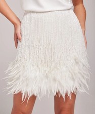 Nadine Merabi Sara White