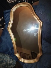 UNUSUAL SHAPE WALL MIRROR WITH