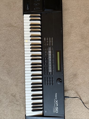 Roland synthesizer - roland,