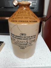 J.H. Jones & Sons Stoneware flagon for beverages.
