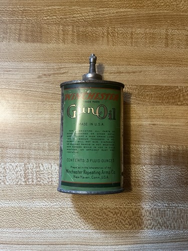 Antique winchester gun oil can - gun,