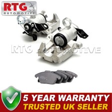 Rear Brake Calipers + Pads