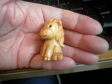 Carved wood , netsuke size 