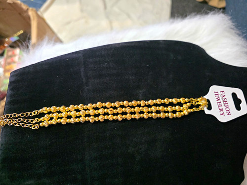 Gold tone multi strand beaded - tone,