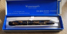 A Watermans 'Conway Stewart Dinkie' fountain pen with a 14ct gold nib