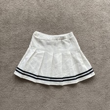 white pleaded skirt