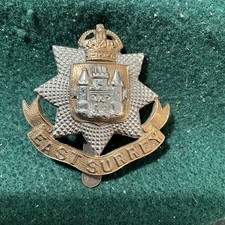 East Surrey bi metal cap badge- with slider - early version.  U94