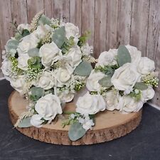 Wedding bouquet flowers with greenery. Buttonhole corsages, flower girl wand