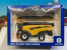 BRITAINS.FARM.1:32.FORD. NEW HOLLAND CX880 COMBINE HARVESTER.REMOVABLE HEADER.