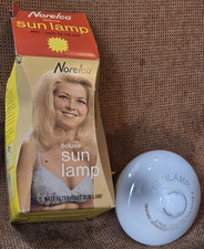 New norelco deluxe sunlamp - new,