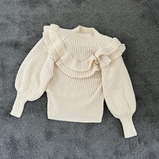 Cream Ruffle Bib Statement