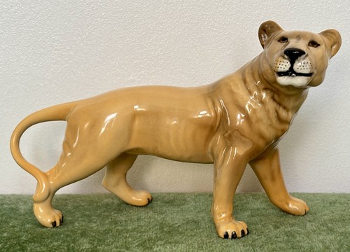 Beswick lioness facing right - -,