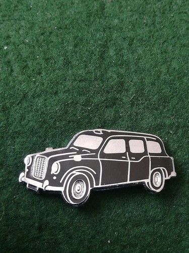 Old enamel black cab - old,