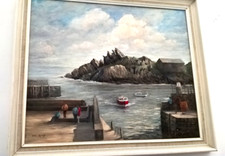 Original painting on board sea side rocks and boats  in nice frame