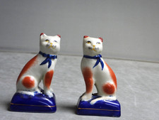 Pair Of Vintage Cat Figurines  Staffordshire Style on  Blue cushions VGC