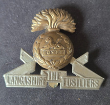 The Lancashire Fusiliers British Military Cap Badge with Slider