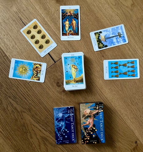 Lovers tarot cards and book