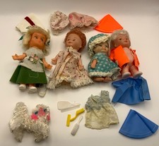 4 x UNUSUAL VINTAGE 1970s SMALL DRESSED PLASTIC DOLLS 4-5”  & CLOTHES