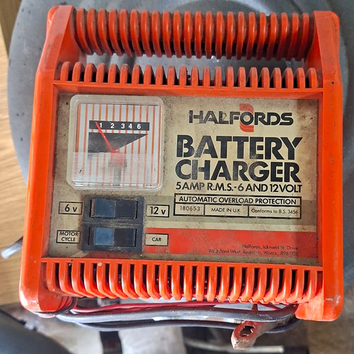 Battery charger and 12v 12 - battery, 6v