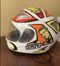 The helmet in the image is an AGV Ti-Tech Valentino Rossi Mugello 2006 "Manara