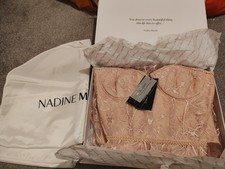 Nadine Merabi Box, Tags And