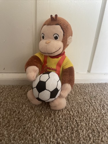 Curious george plush holding - plush,
