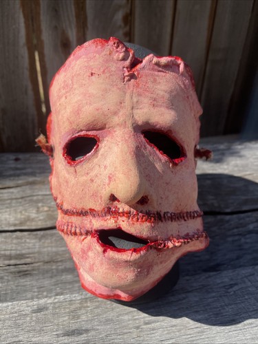 Bloody stitched severed human - bloody,