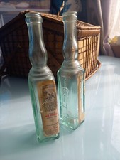 Vintage GLASS BOTTLE PAIR Boukha L'oasis Tunusian Fig Water? Unusual shaped.