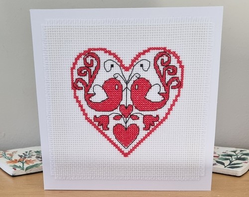 Hand stitched completed - hand, cross