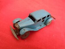 TINPLATE CLOCKWORK PENNY TOY