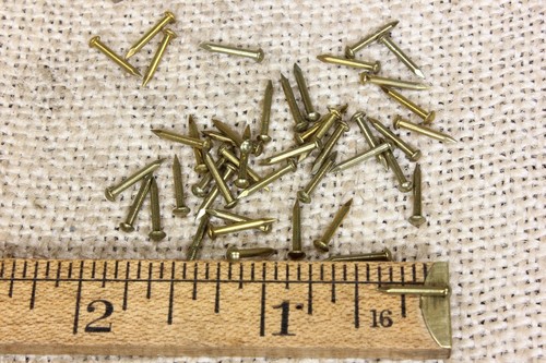 Old brass brads 50 - 3/8”,