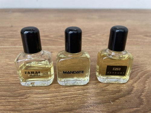 Three vintage miniature men's