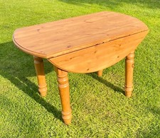 Solid pine drop leaf table in great solid condition Victorian style.