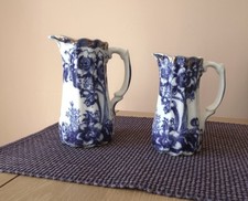 A pair of old blue and white porcelain jugs, vgc